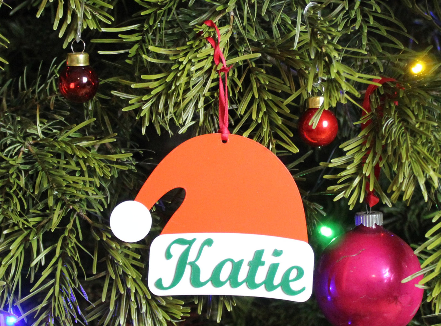 Personalised Santa Hat Ornament on a Christmas tree