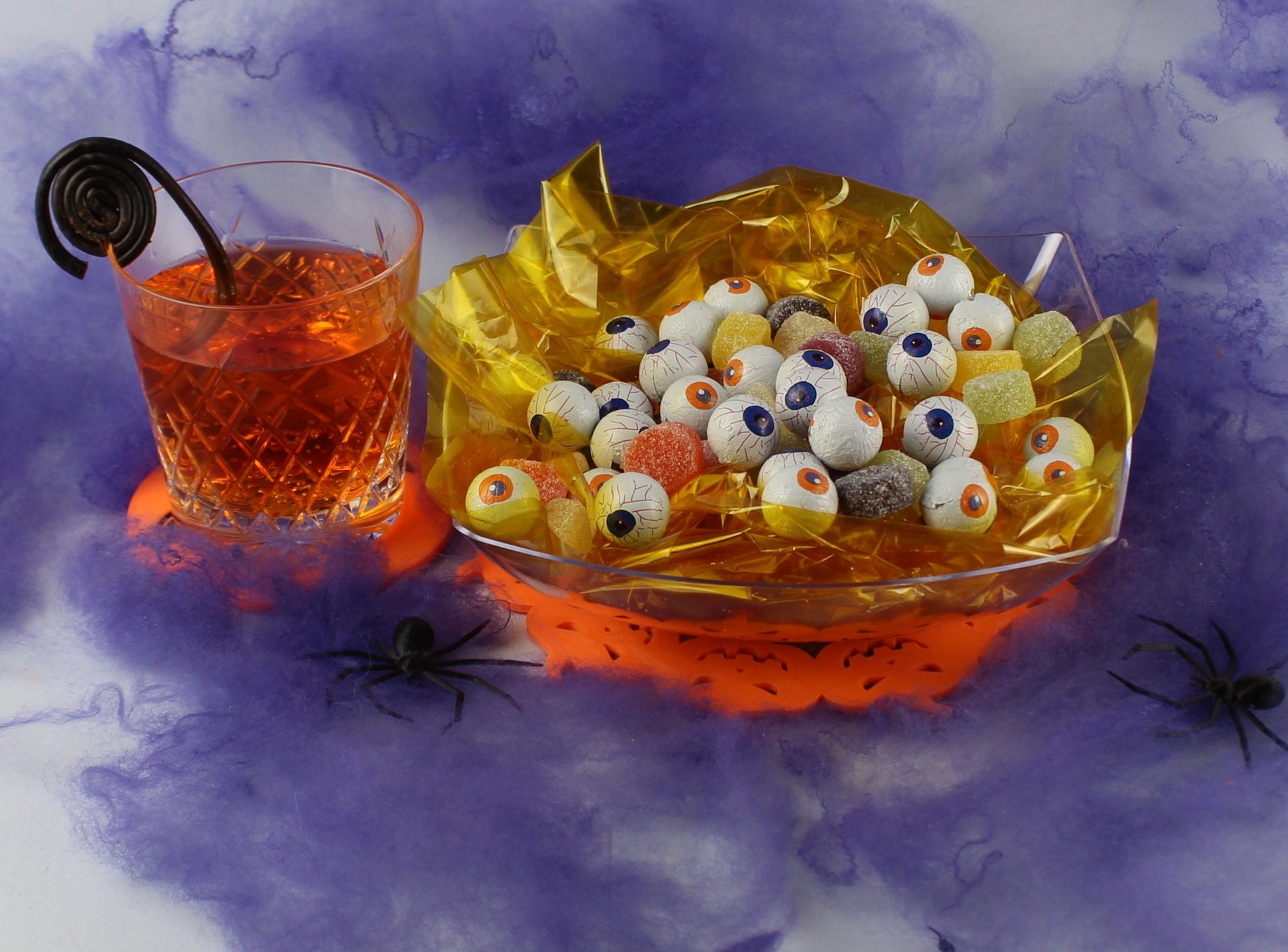 3D Printed Pumpkin Table Decoration on a Table With a Bowl of Candy
