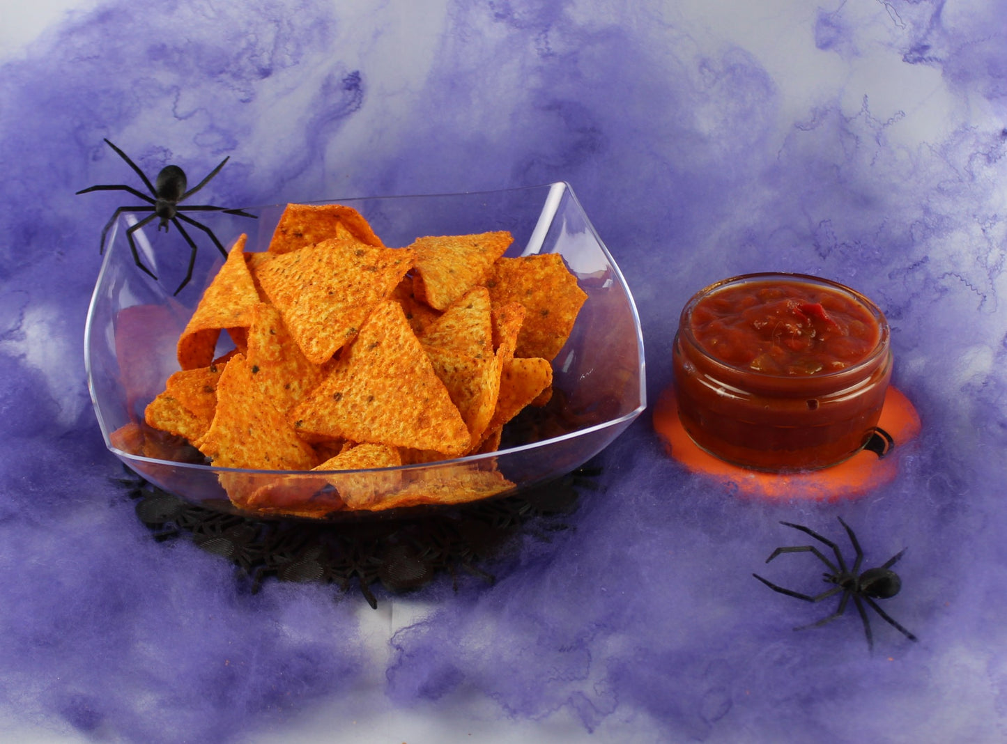 3D Printed Spiders Table Decoration on a Table With a Bowl of Nachos