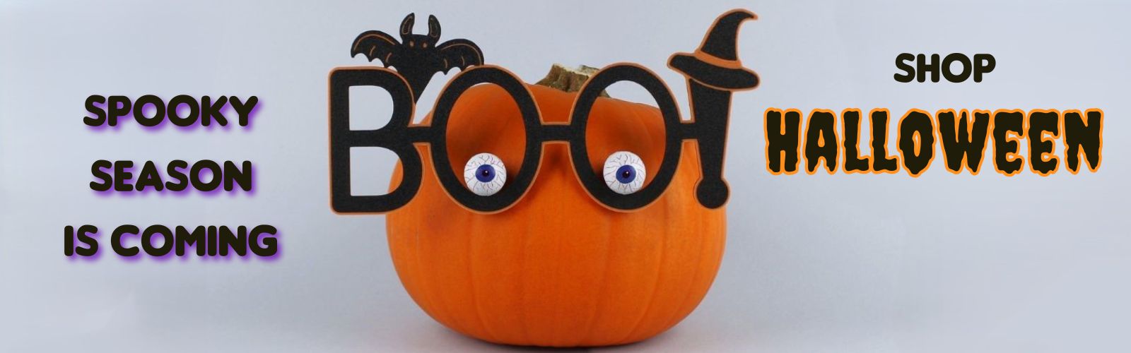 Pumpkin with 'BOO!' glasses and Halloween-themed text on a light gray background