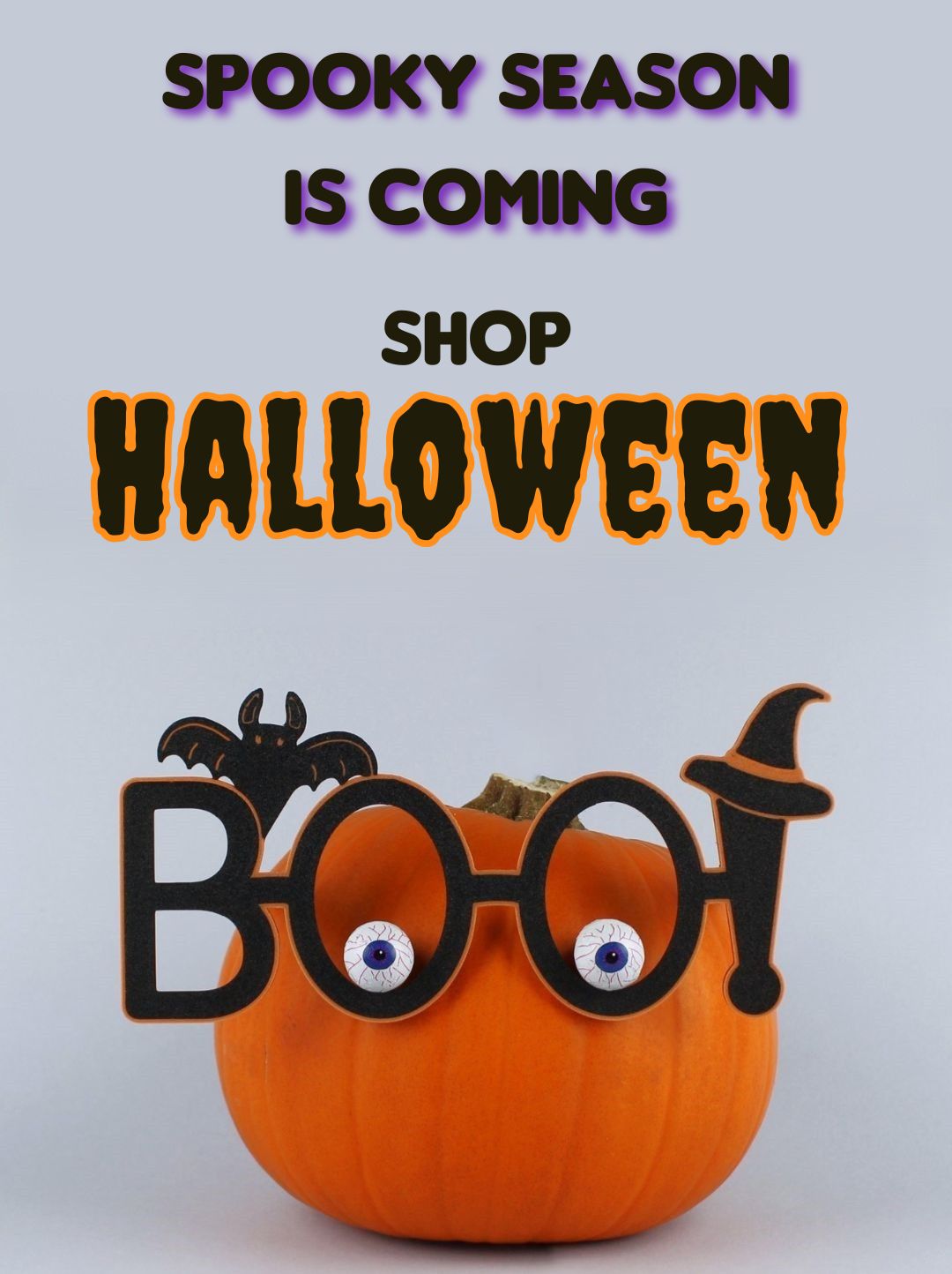 Halloween-themed pumpkin with decorative glasses and text 'Spooky season is coming. Shop Halloween.'