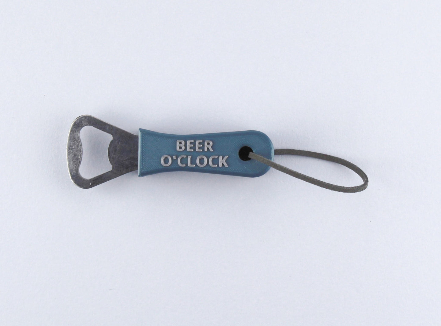 Blue Personalised Bottle Opener with the inscription BEER O'CLOCK in silver, and a Leather Strap