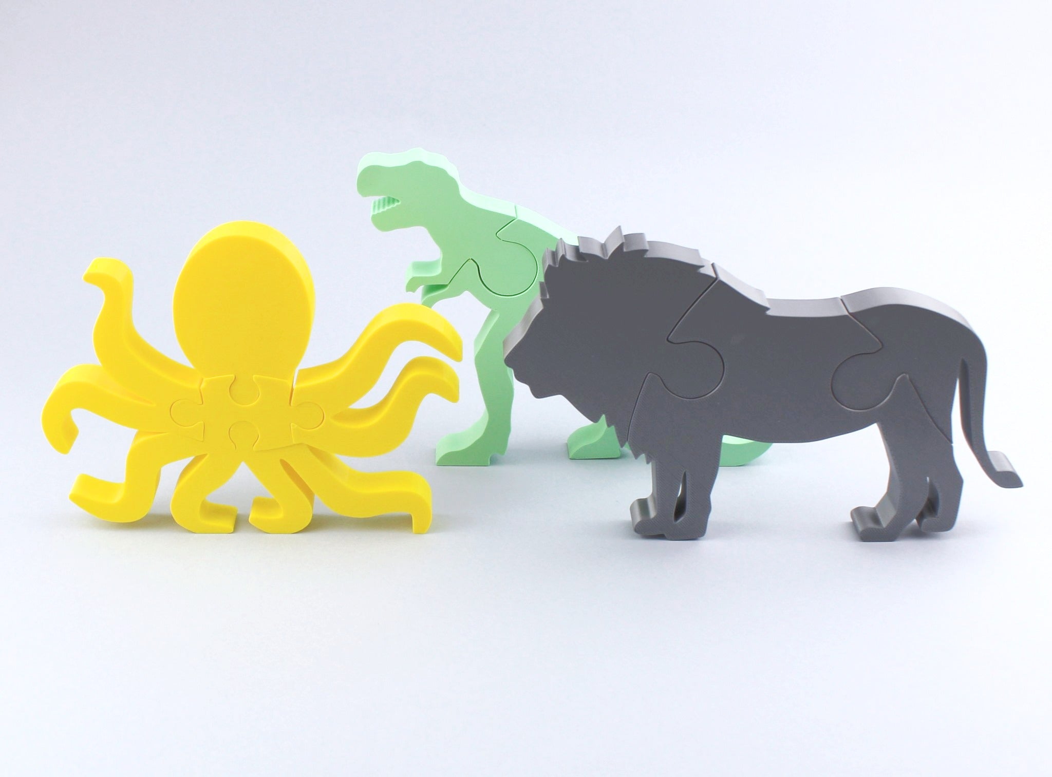 Three animal puzzles: t-rex, lion, octopus