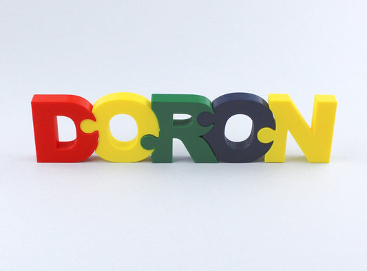 A puzzle of the name Doron standing