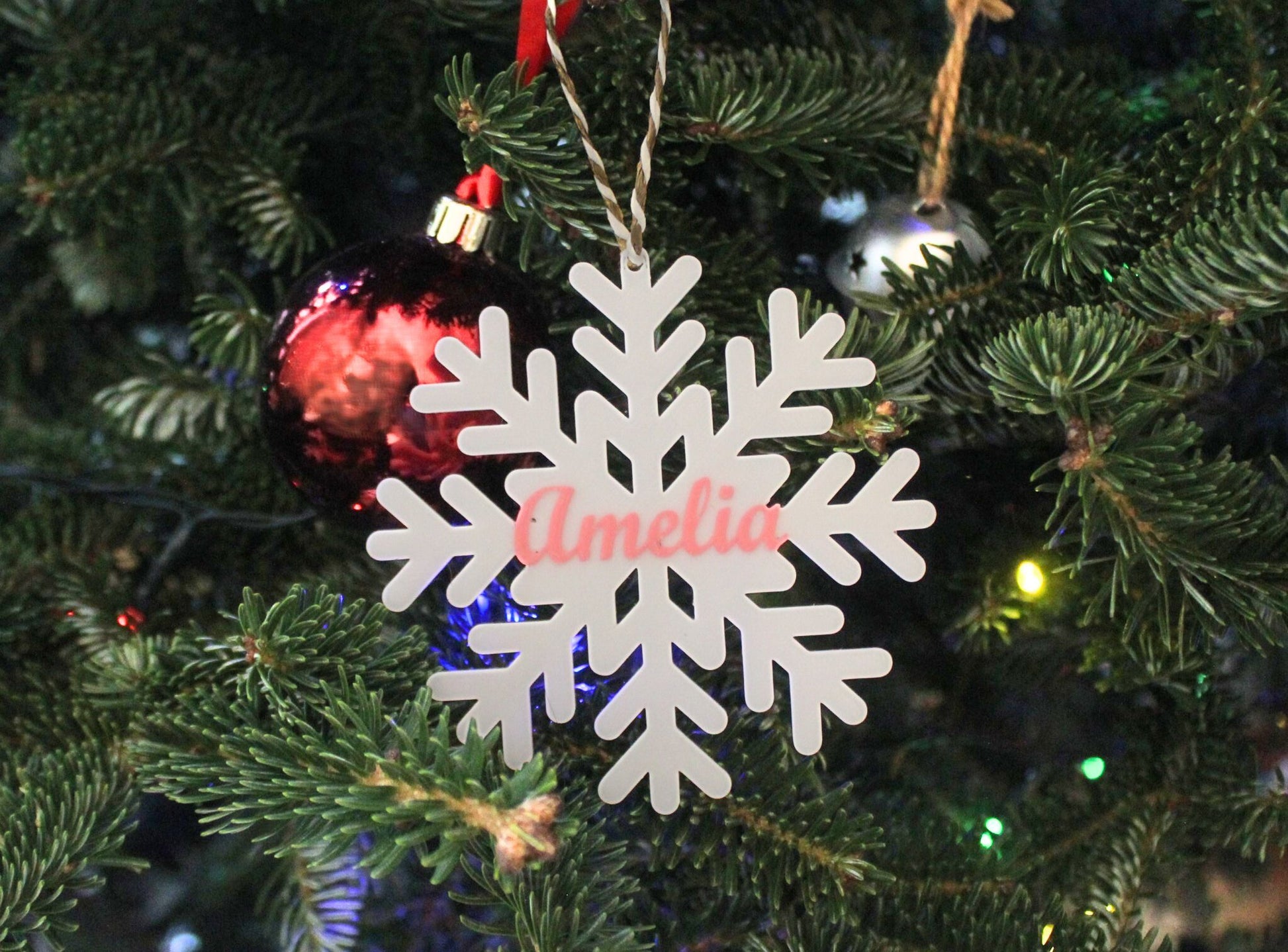 3D Printed Personalised Snowflake Christmas Ornament On a Christmas Tree