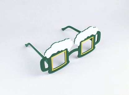 Green 3D-Printed St. Patrick's Day beer mug-shaped novelty glasses on a light gray background