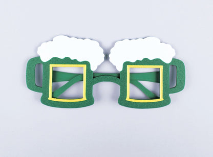 Green 3D-Printed St. Patrick's Day beer mug-shaped novelty glasses on a light gray background