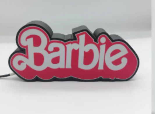 Barbie logo light box in pink and white on a black background