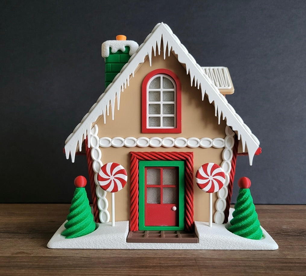 Gingerbread house with candy decorations on a dark background