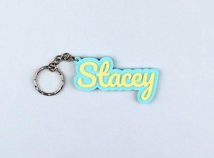 3D Printed Keychain with 'Stacey' on a light blue background
