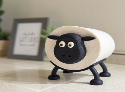 A Sheep Toilet Roll Holder with a blurred indoor background