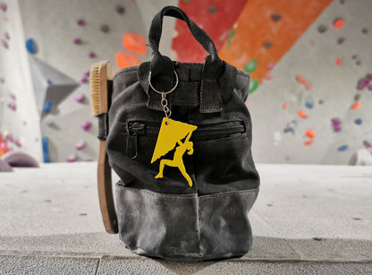 Chalk Bag With A Yellow Rock Climbing Figure Keychain